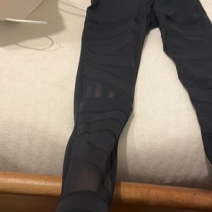 Lululemon Leggings. Worn once. Size 6. with mesh cutouts